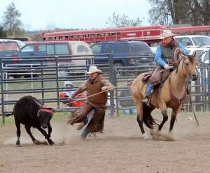 Denny Ashcraft (mounted) and Luke Kennedy are in action at a rodeo sponsored by the Jackson County Fair Association. The fifth annual Jackson County Rodeo is Friday and Saturday, July 24 and 25, at the Northeast Kansas Heritage Complex, south of Holton on Highway 75, and just west on 214 Road.